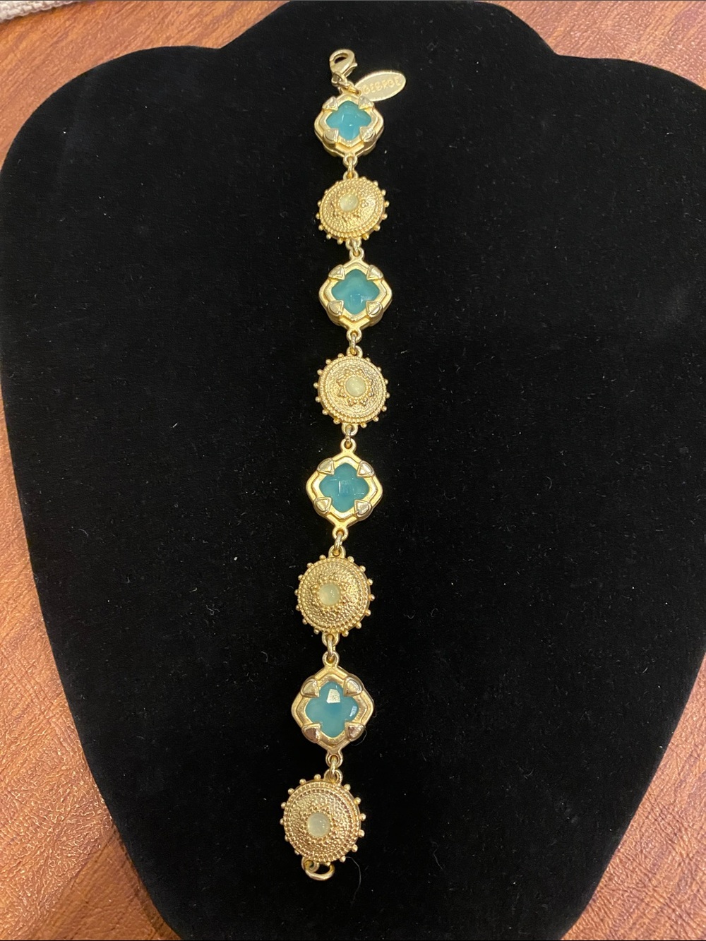 George gold tone bracelet with blue stones
